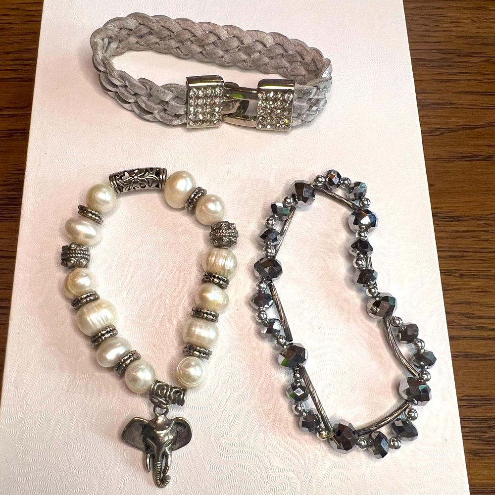 Bundle of three silver bracelets